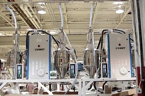 Two HCD-100 Honeycomb Dryers and four CDH-75 Hot Air Dryers mounted on stands